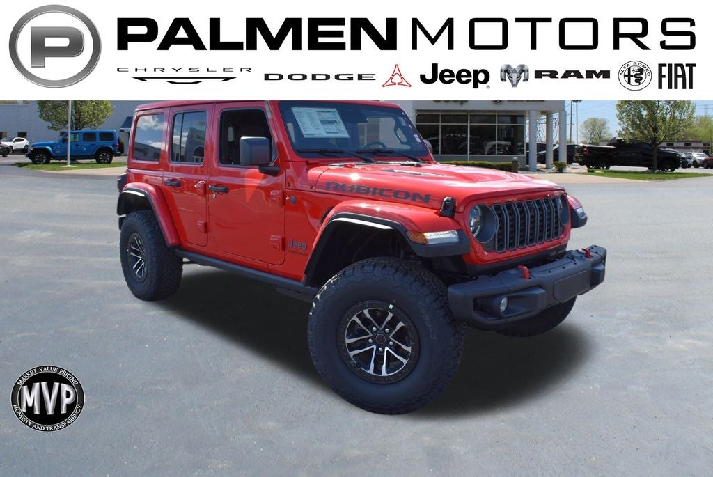 2026 Jeep Wrangler Rubicon X in Firecracker Red Clear-Coat Exterior Paint — front three-quarter view
