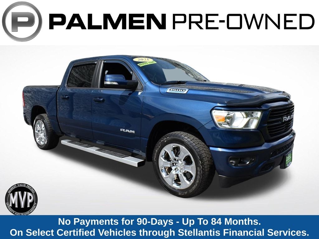 2021 RAM 1500 Big Horn/Lone Star in Patriot Blue Pearlcoat — front three-quarter view