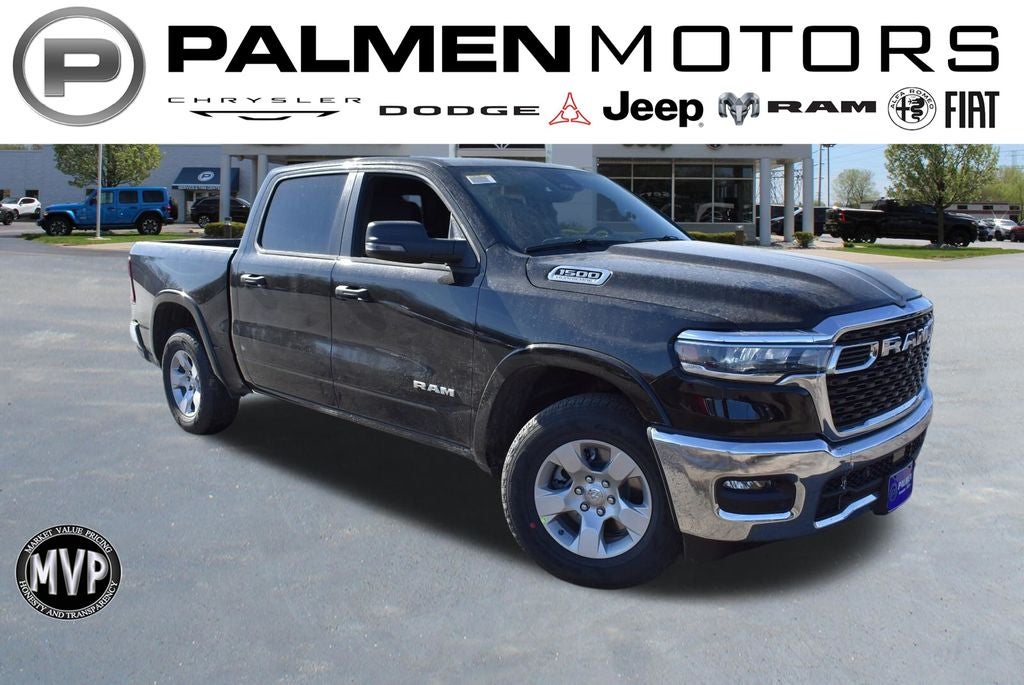 2026 RAM 1500 Big Horn/Lone Star in Diamond Black Crystal Pearl-Coat Exterior Paint — front three-quarter view