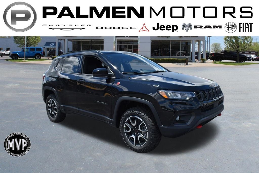 2026 Jeep Compass Trailhawk in Diamond Black Crystal Pearl-Coat Exterior Paint — front three-quarter view